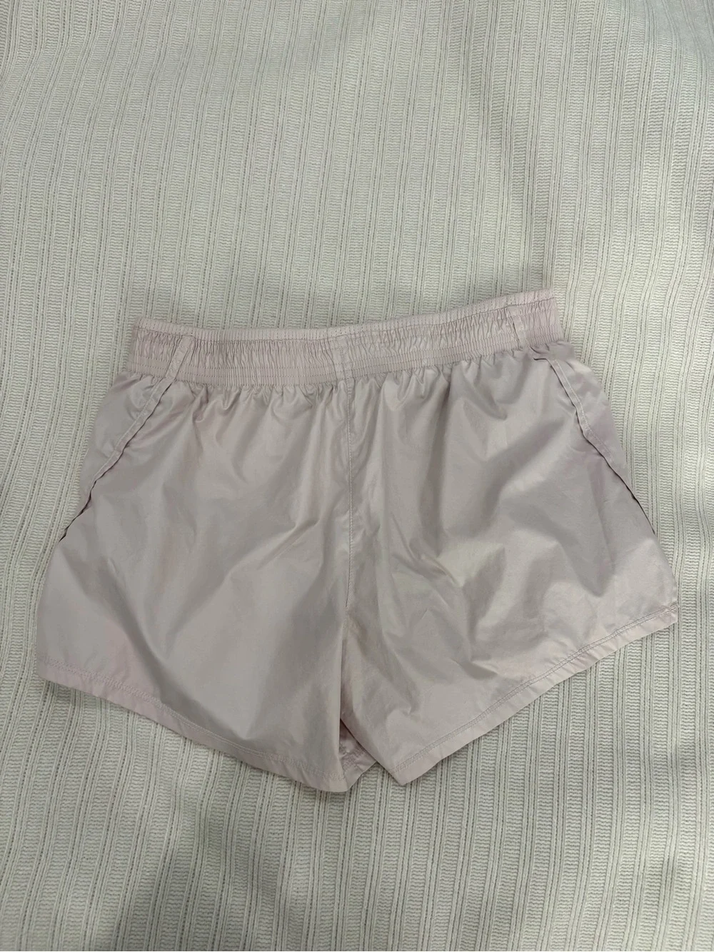 Nike Women’s Pale Pink Athletic Shorts with White Swoosh
